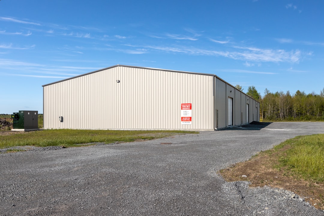 Metal Building Cost Guide 2026: 16x20 and 24x24 Pricing